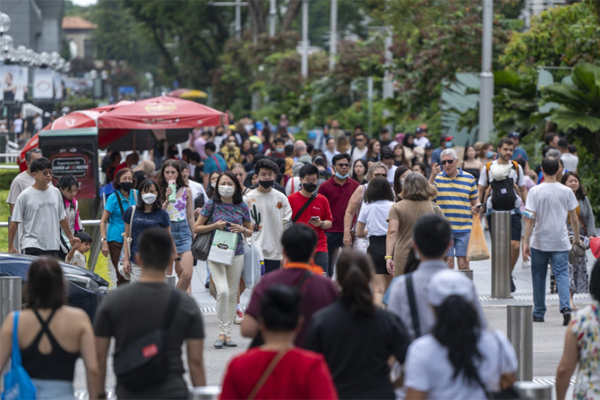 Singapore population rises most in 15 years to a record