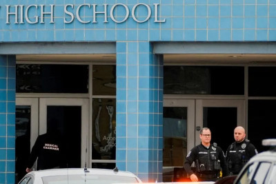 Iowa principal who saved pupils from school shooting dies